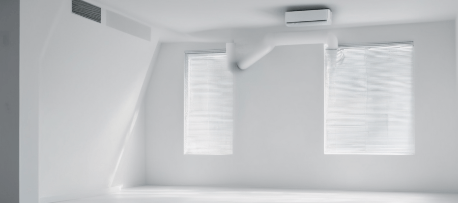 Air duct cleaning service recommendations - professional technician inspecting Dubai HVAC system